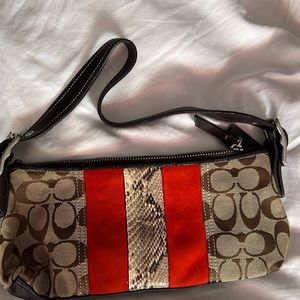 Authentic Coach brown leather, red suede and leopard  monogram purse.